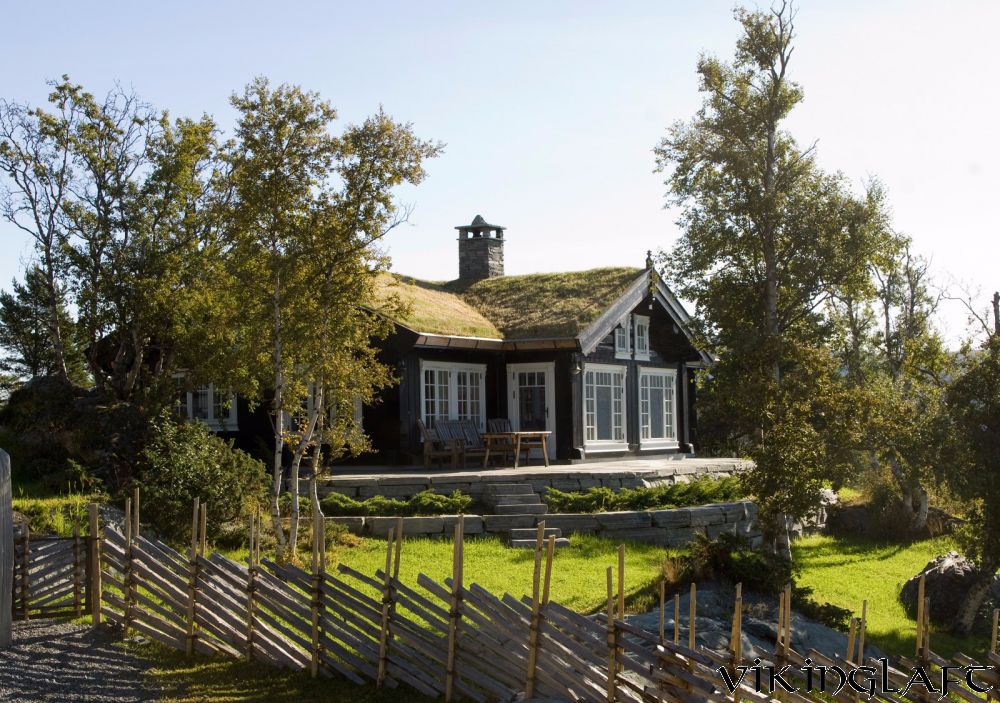 Mørkbeisede laftehus – bilde 2